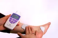 elektroder på fot, tibialisstimulering.